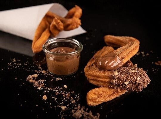 KitKat Churros dipped in chocolate sauce