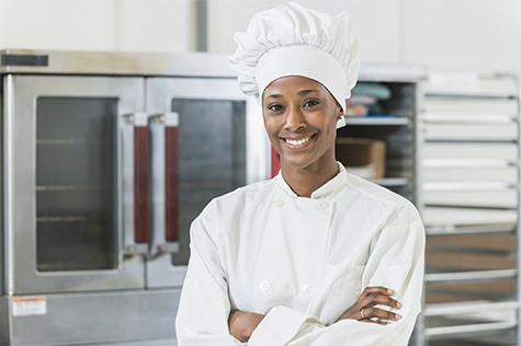 Chef smiling in kitchen