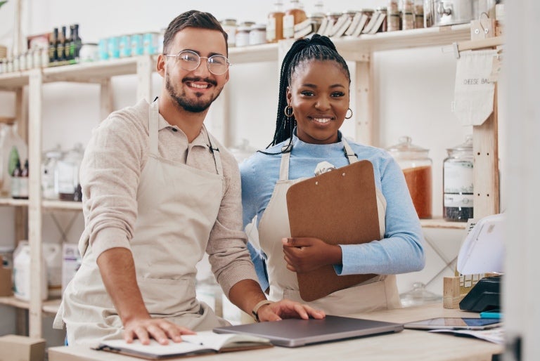 manager and employee smiling