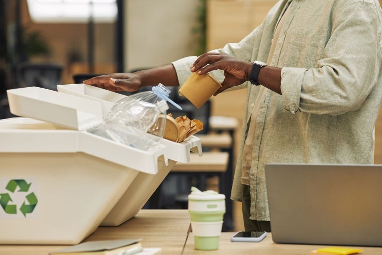 a green office environment using containers to encourage employees recycling practices